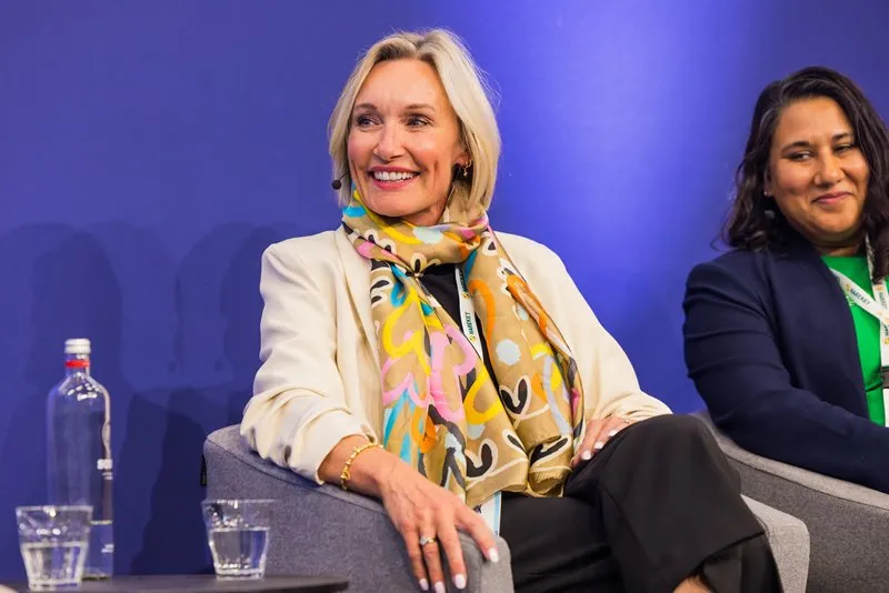 Speaker participates in a panel discussion on stage at Breakbulk Europe.