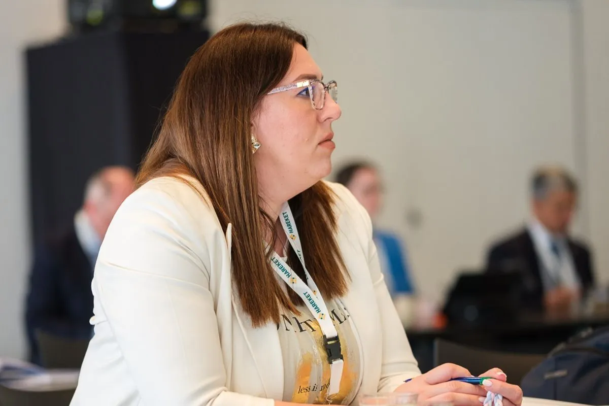 Attendee listens during a heavy lift workshop at Breakbulk Europe.