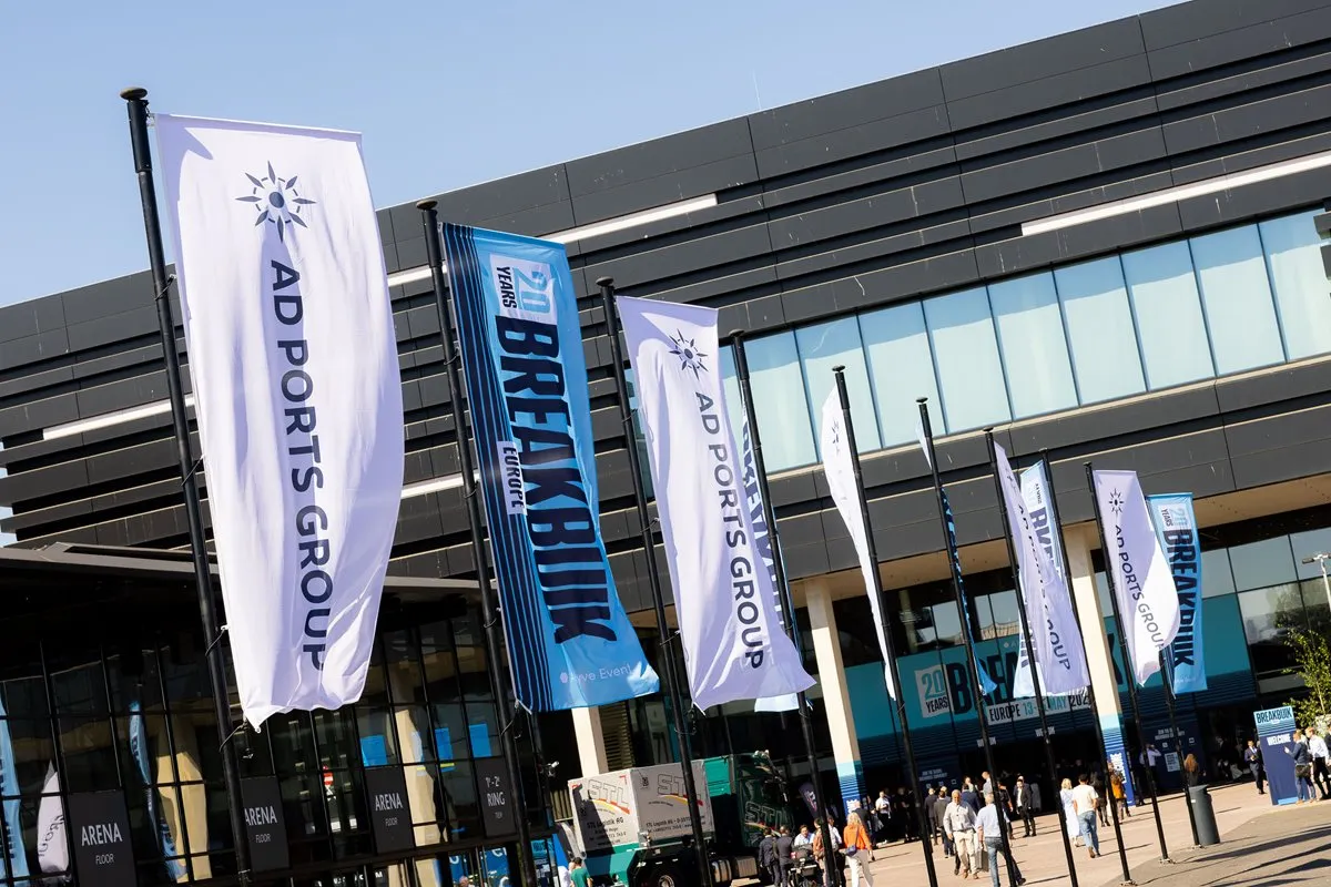 Breakbulk Europe and AD Ports Group flags outside the event venue.