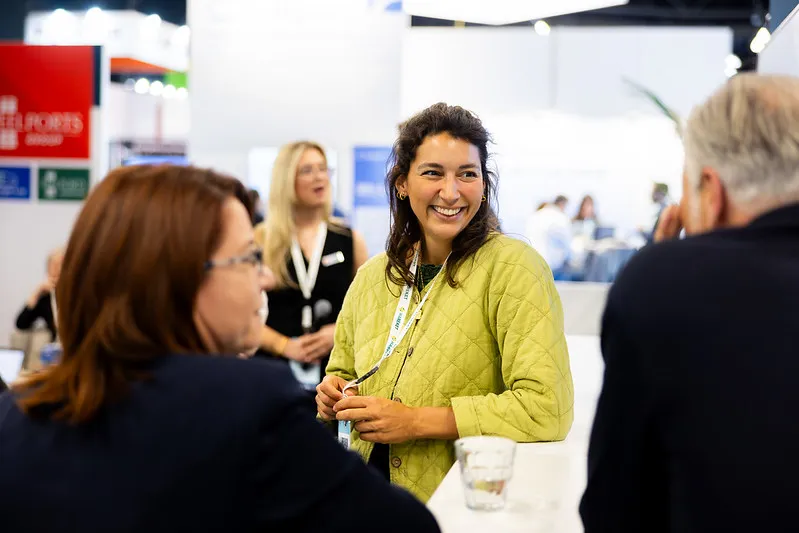 Attendees network and connect on the exhibition floor at Breakbulk Europe.