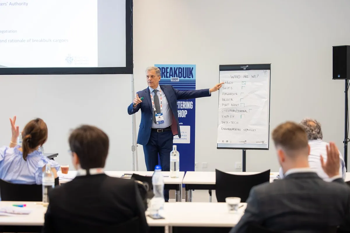 Presenter leads an interactive chartering workshop at Breakbulk Europe.