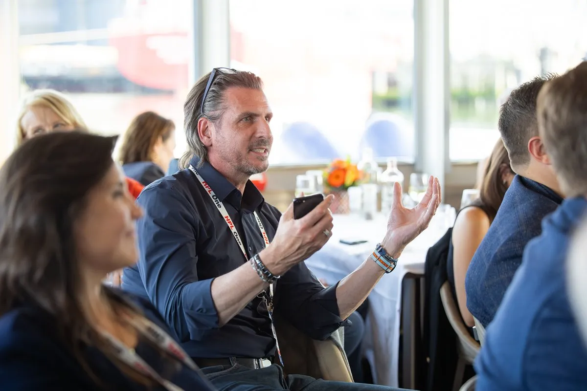 Attendee joins a lively discussion during a networking session at Breakbulk Europe.